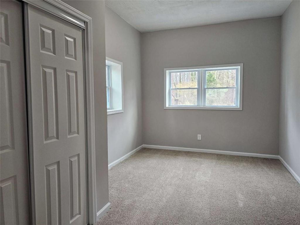 6470 Michell Way Douglasville, GA 30135 - Photo 33 of 41 an empty room with windows