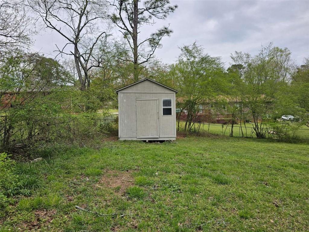 6470 Michell Way Douglasville, GA 30135 - Photo 37 of 41 a front view of house with a garden