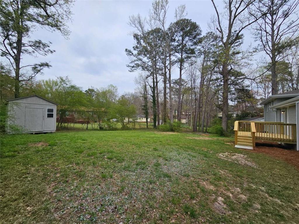 6470 Michell Way Douglasville, GA 30135 - Photo 38 of 41 a view of a yard with a house in the background