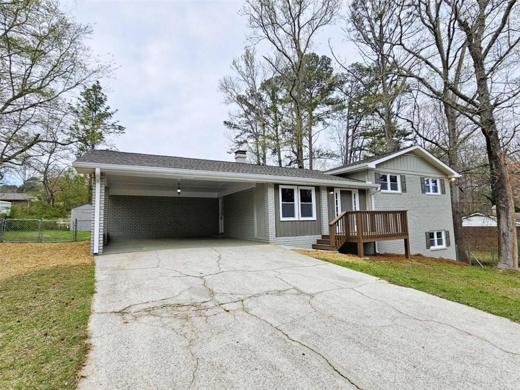 6470 Michell Way Douglasville, GA 30135 - Photo 40 of 41 a front view of house with yard and garage