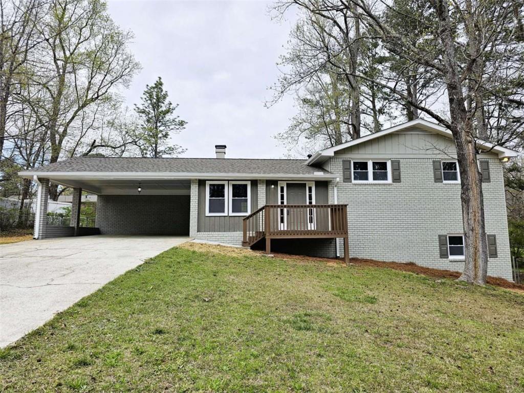 6470 Michell Way Douglasville, GA 30135 - Photo 41 of 41 a front view of a house with yard and parking