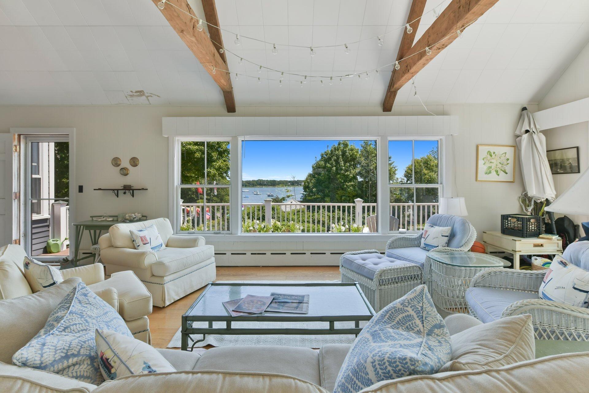 916 Main Street Cotuit, MA 02635 - Photo 11 of 22 a living room with furniture and a large window