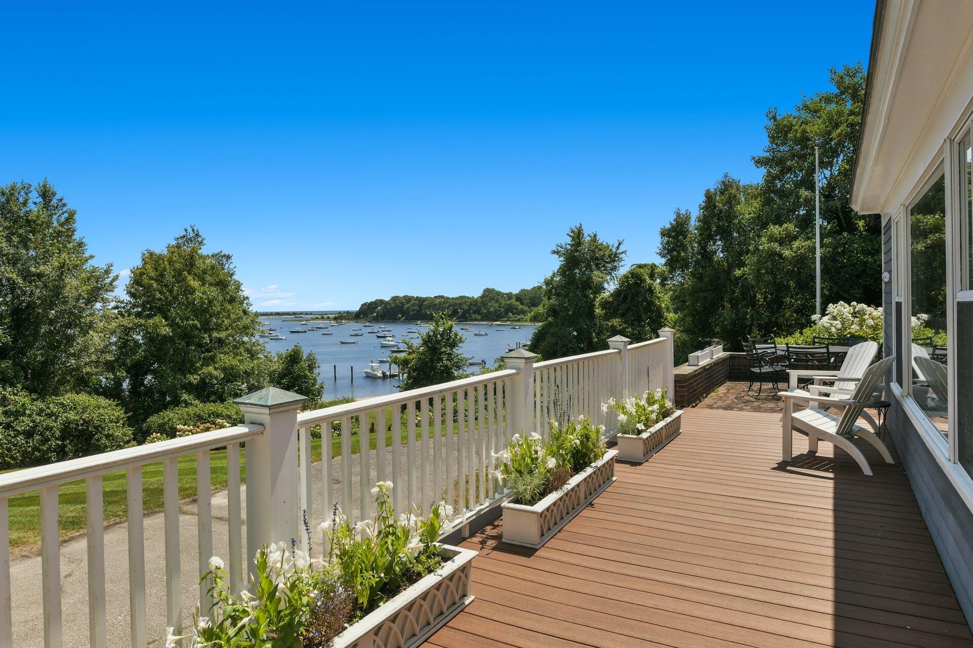 916 Main Street Cotuit, MA 02635 - Photo 10 of 22 a view of balcony with deck and outdoor seating