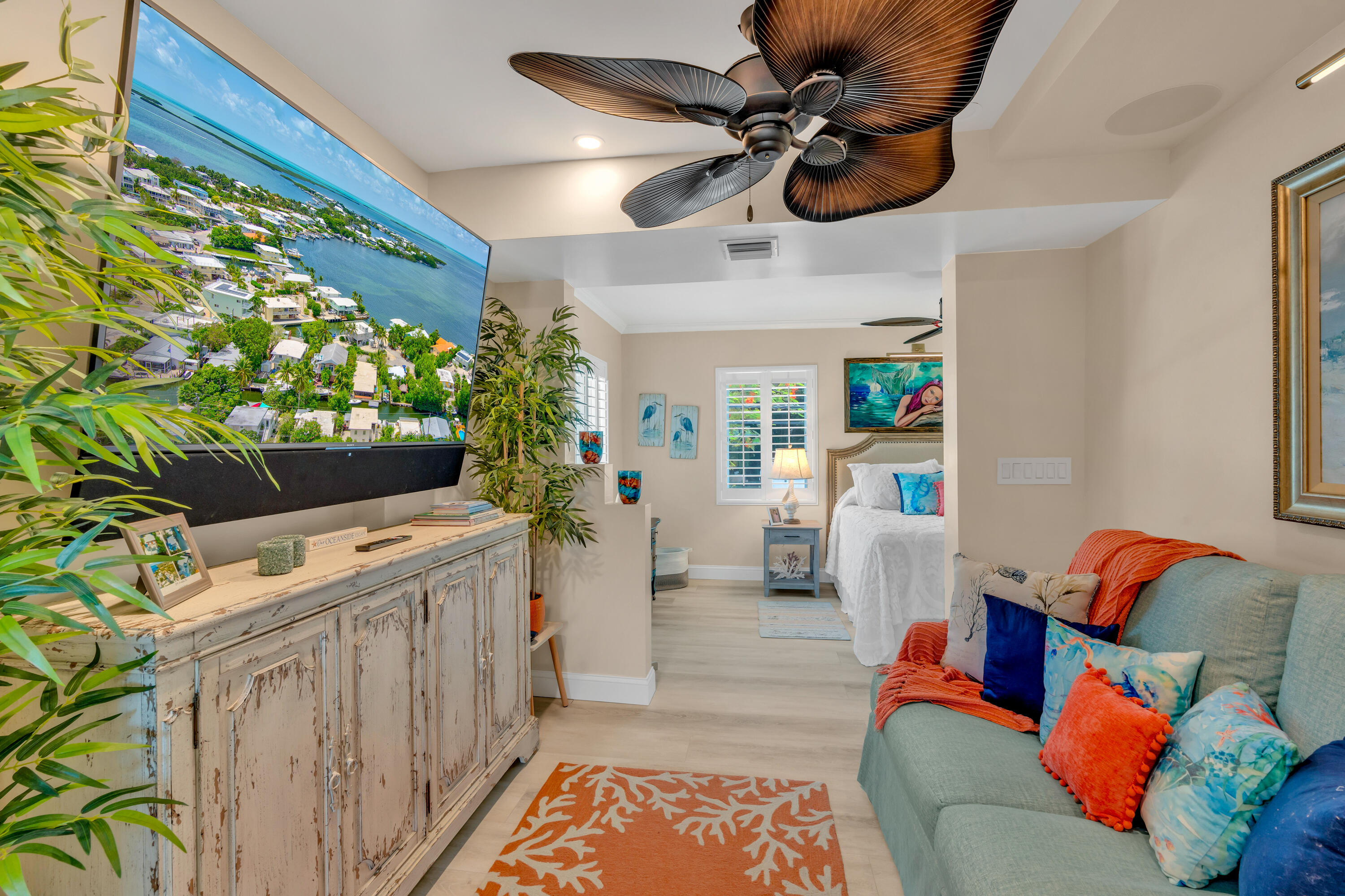 129 Pirates Drive Key Largo, FL 33037 - Photo 11 of 42 a living room with furniture and a flat screen tv