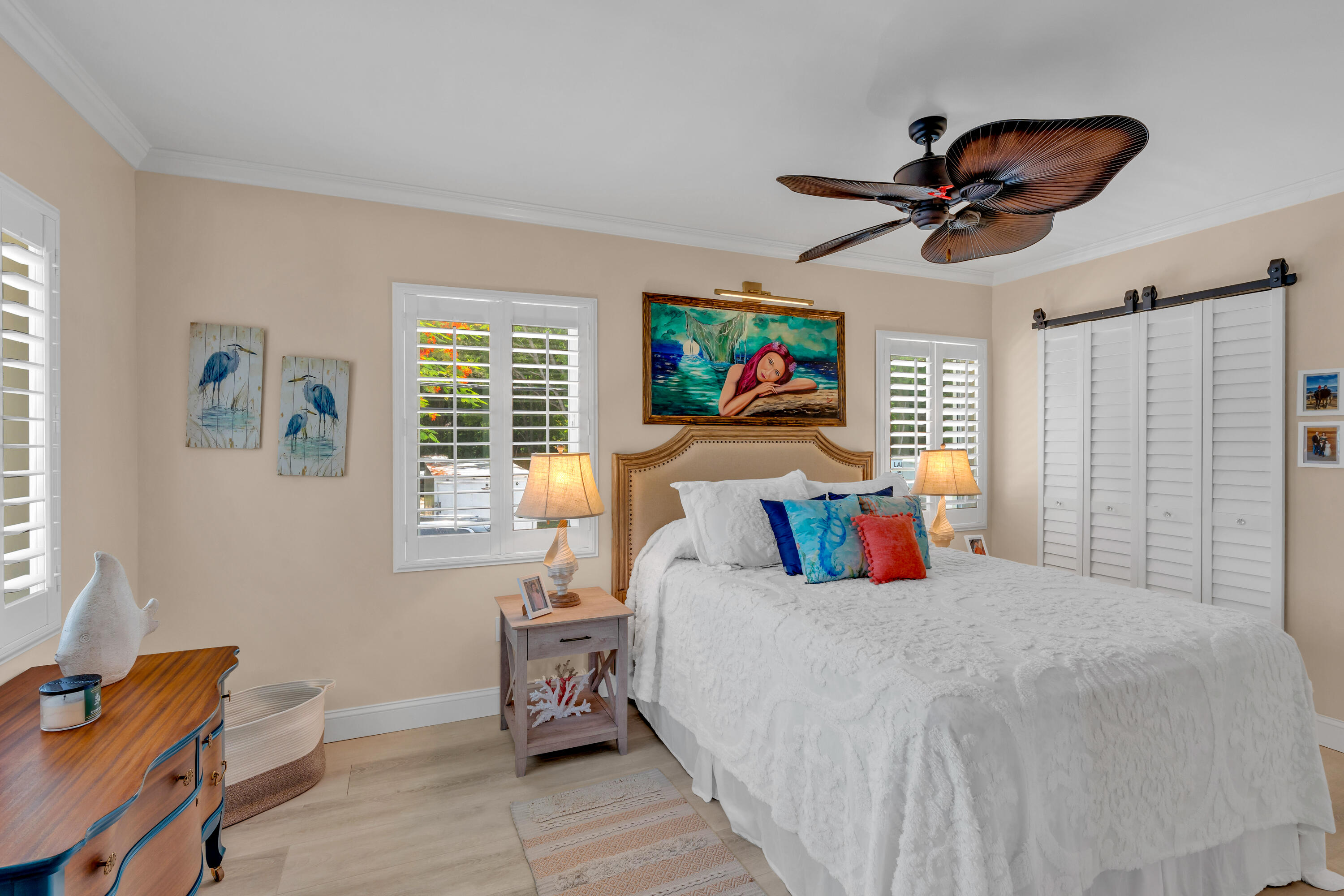 129 Pirates Drive Key Largo, FL 33037 - Photo 13 of 42 a bedroom with a bed and a window