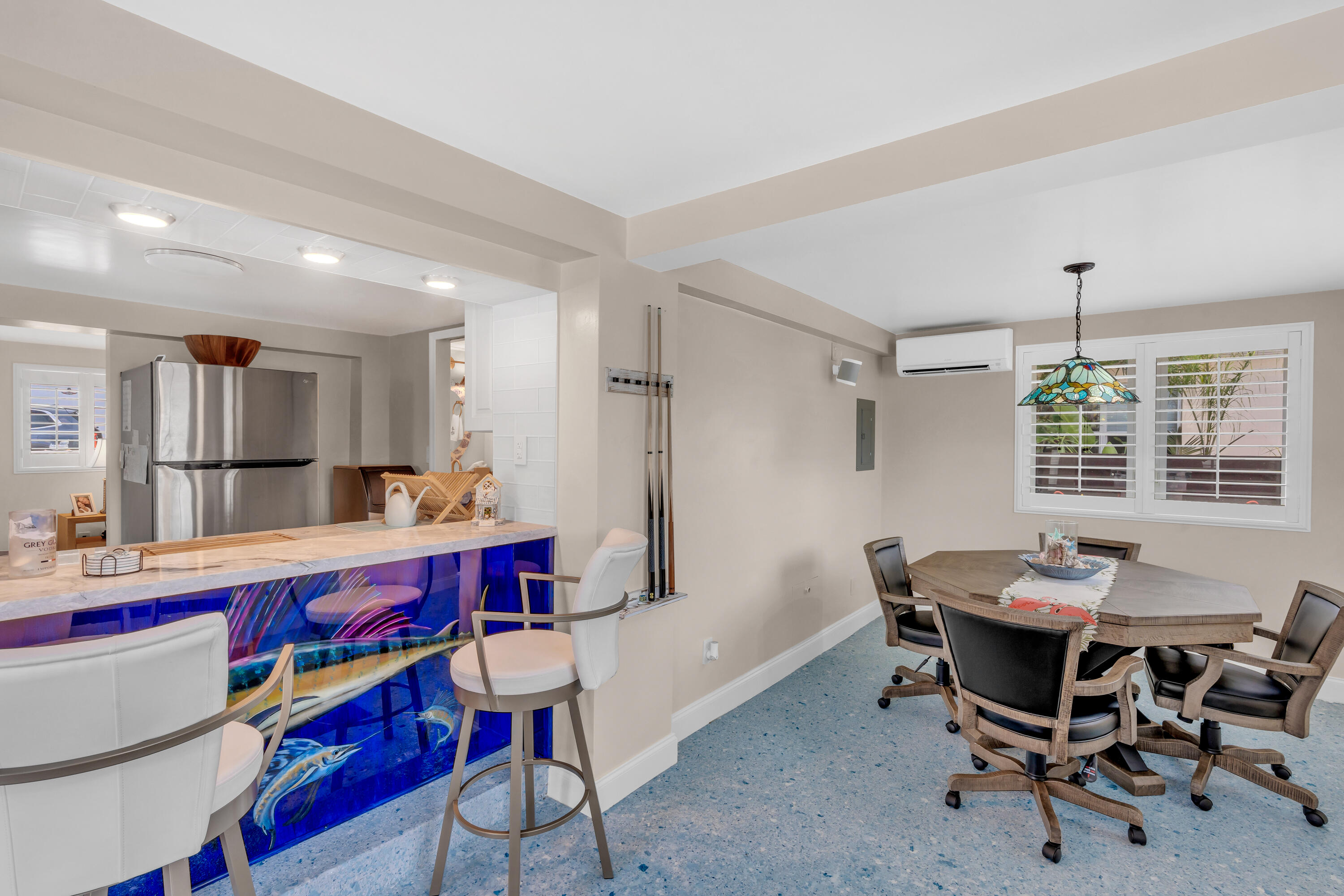 129 Pirates Drive Key Largo, FL 33037 - Photo 17 of 42 a view of a dining room with furniture and window