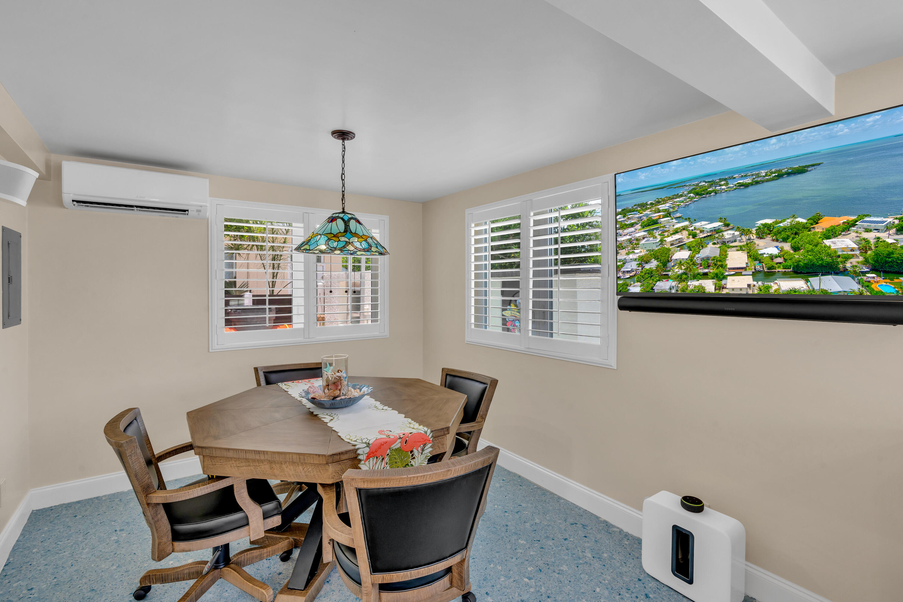 129 Pirates Drive Key Largo, FL 33037 - Photo 19 of 42 a view of a dining room with furniture window and outside view