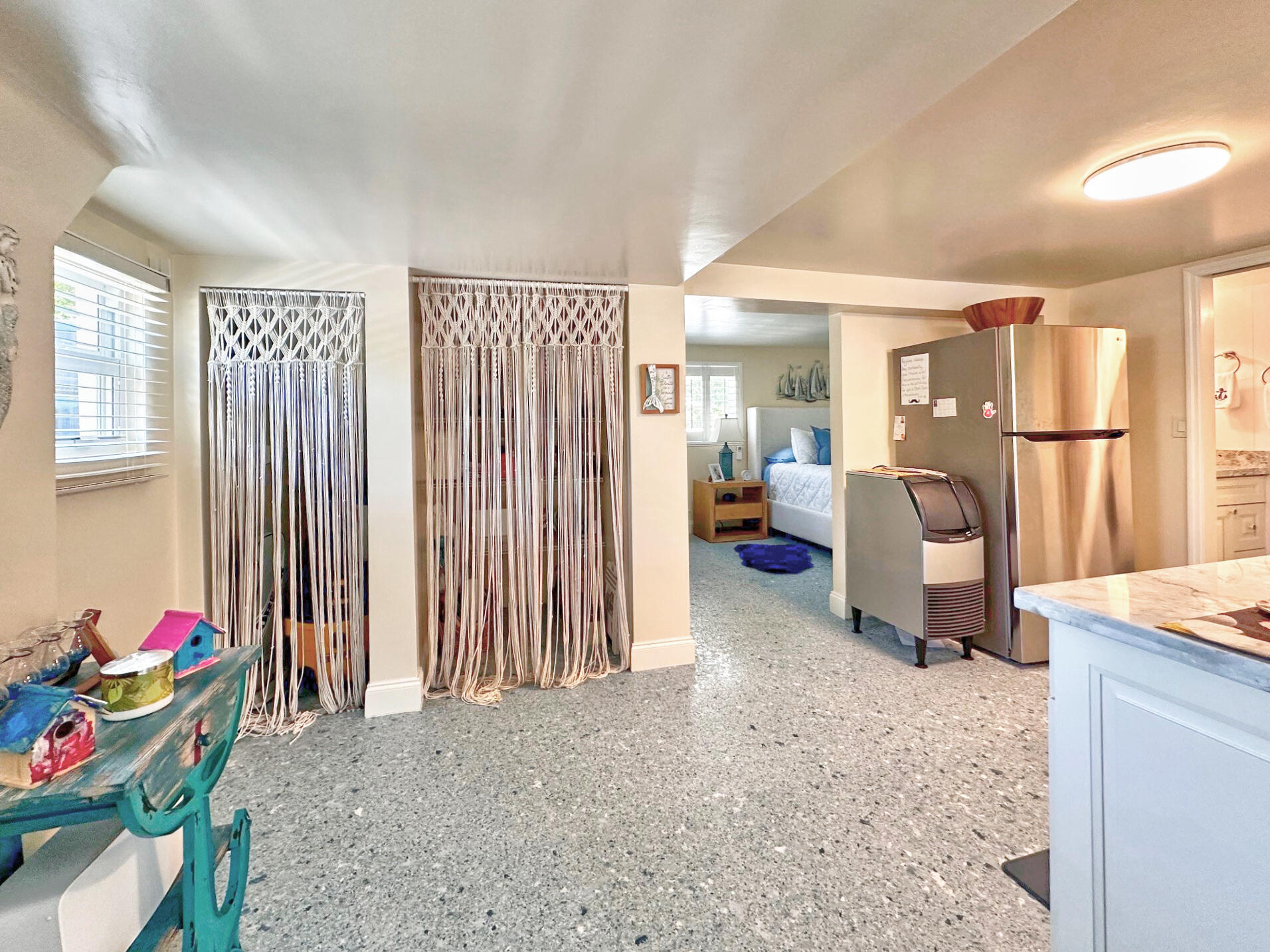129 Pirates Drive Key Largo, FL 33037 - Photo 21 of 42 a living room with furniture and a large window