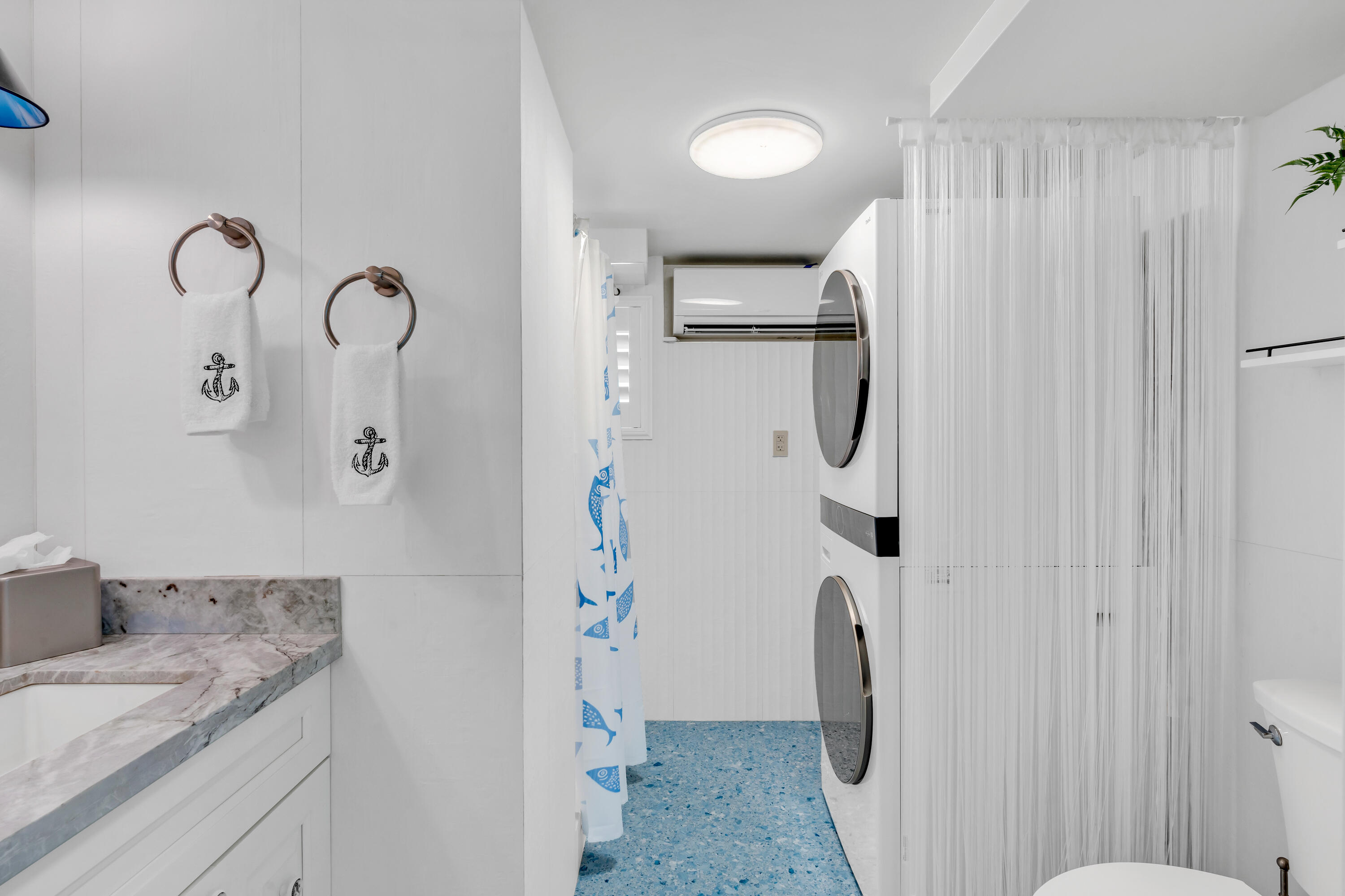 129 Pirates Drive Key Largo, FL 33037 - Photo 26 of 42 a bathroom with a granite countertop sink and a mirror