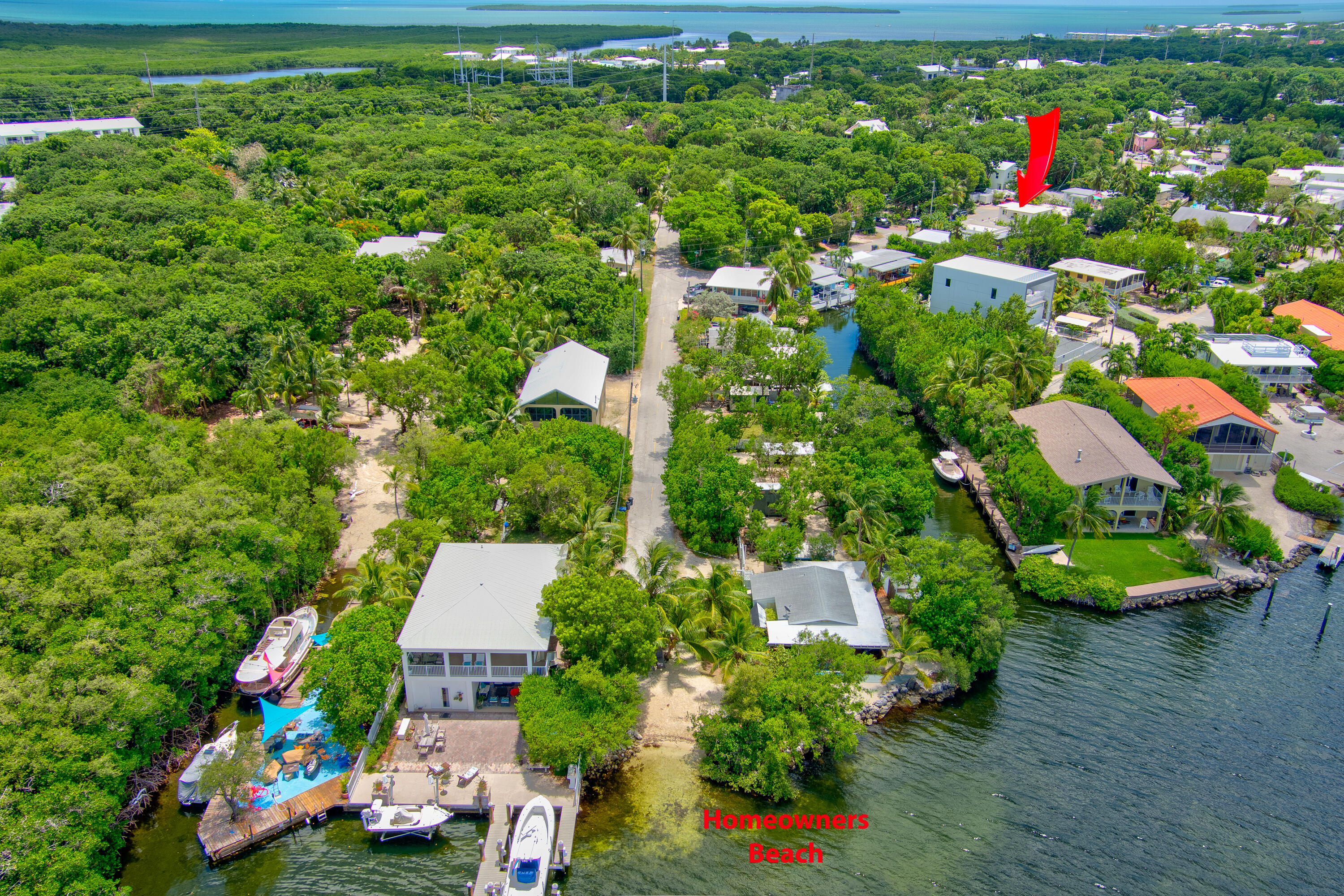 129 Pirates Drive Key Largo, FL 33037 - Photo 34 of 42 an aerial view of a house with a yard