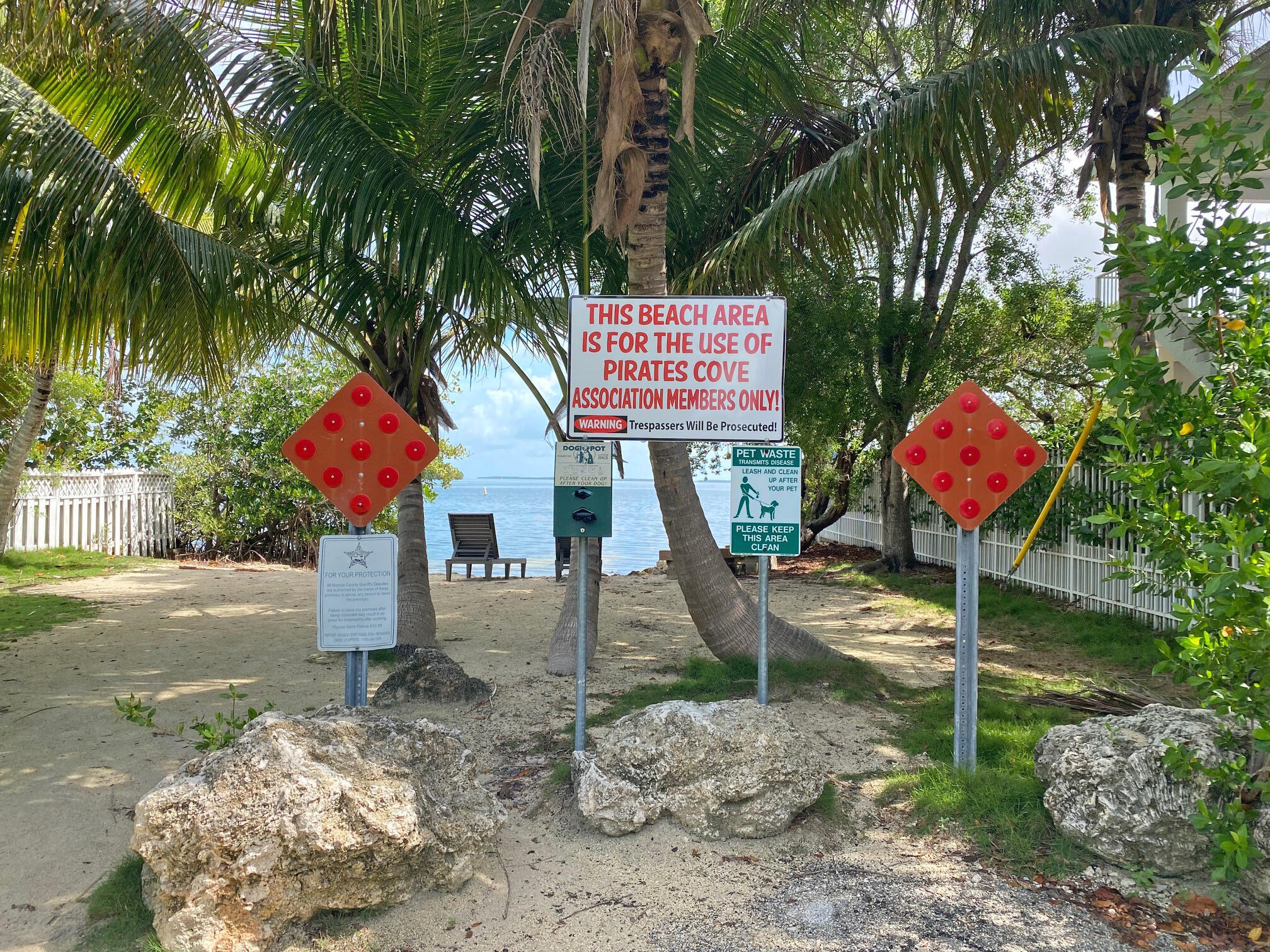 129 Pirates Drive Key Largo, FL 33037 - Photo 36 of 42 a front view of a house with garden