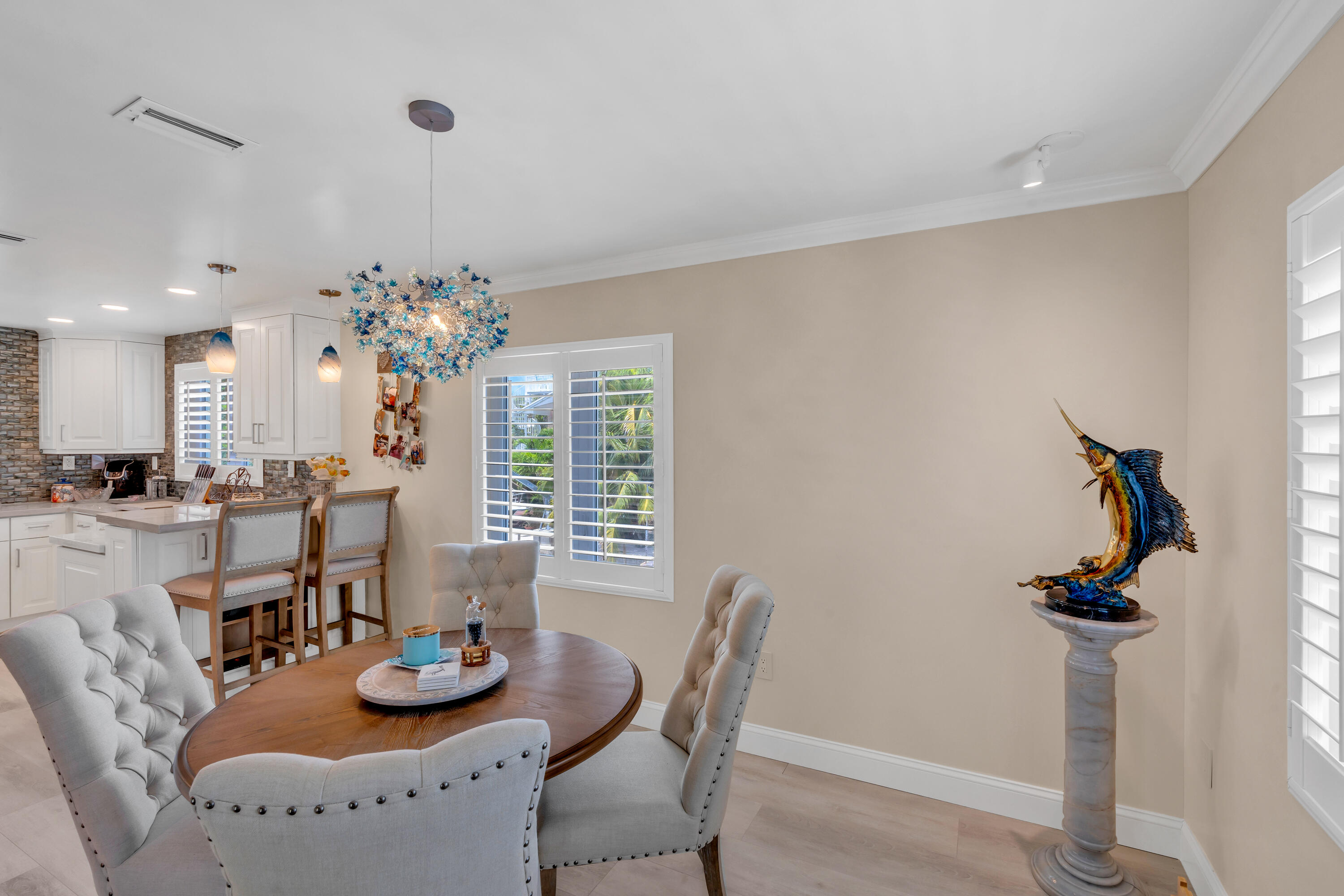 129 Pirates Drive Key Largo, FL 33037 - Photo 9 of 42 a dining room with furniture and window
