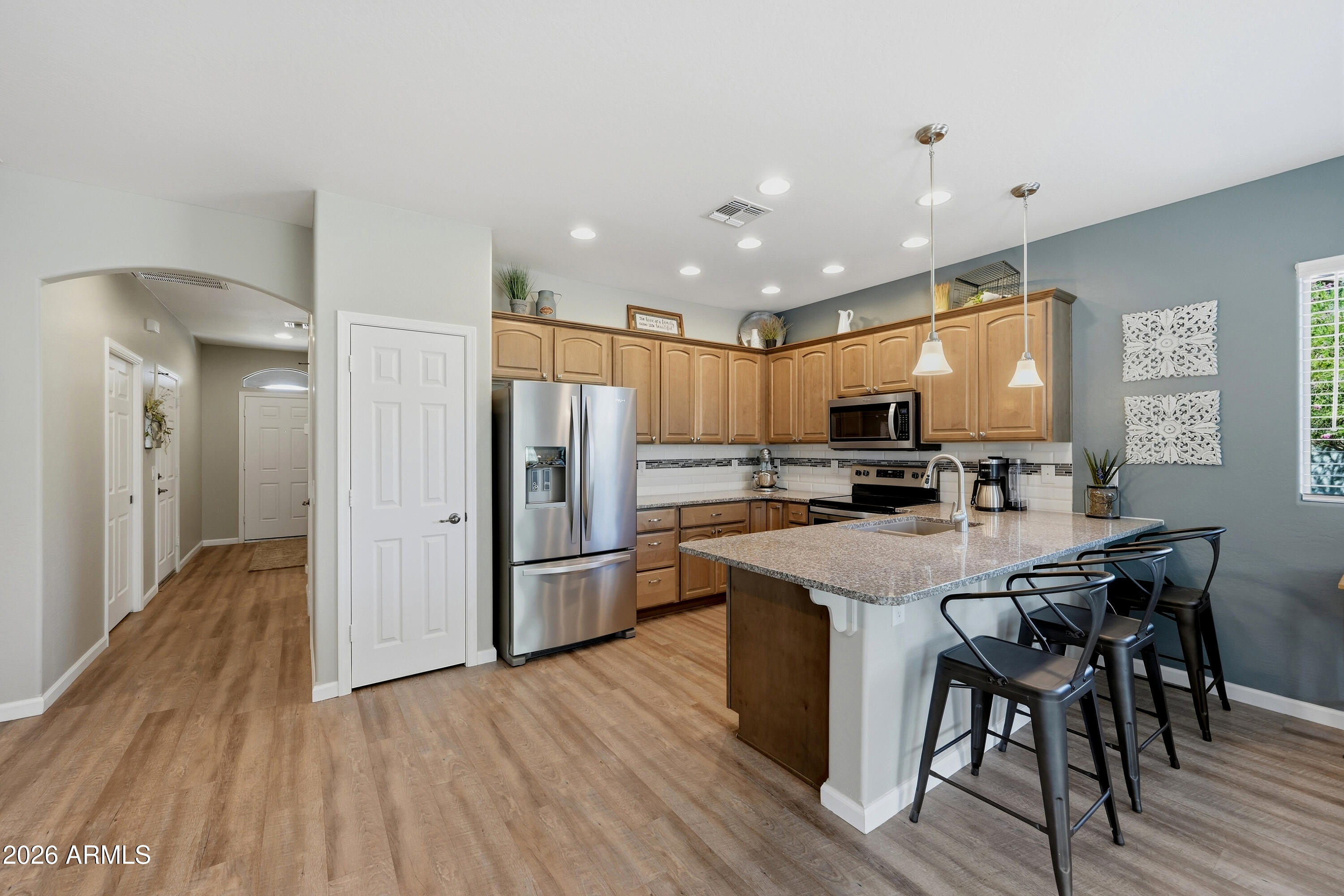 3117 South Signal Butte Road, Unit 525 Mesa, AZ 85212 - Photo 9 of 53 SC525 Kitchen Breakfast Bar