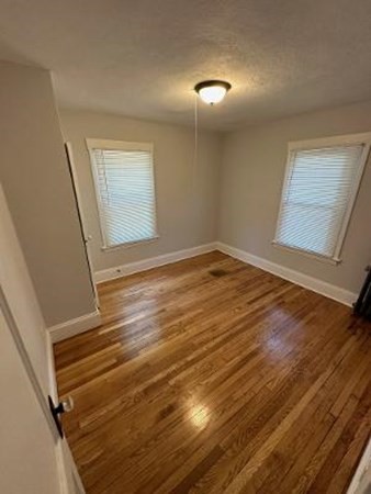 37-39 Fountain Street Springfield, MA 01108 - Photo 13 of 13 a view of empty room with wooden floor