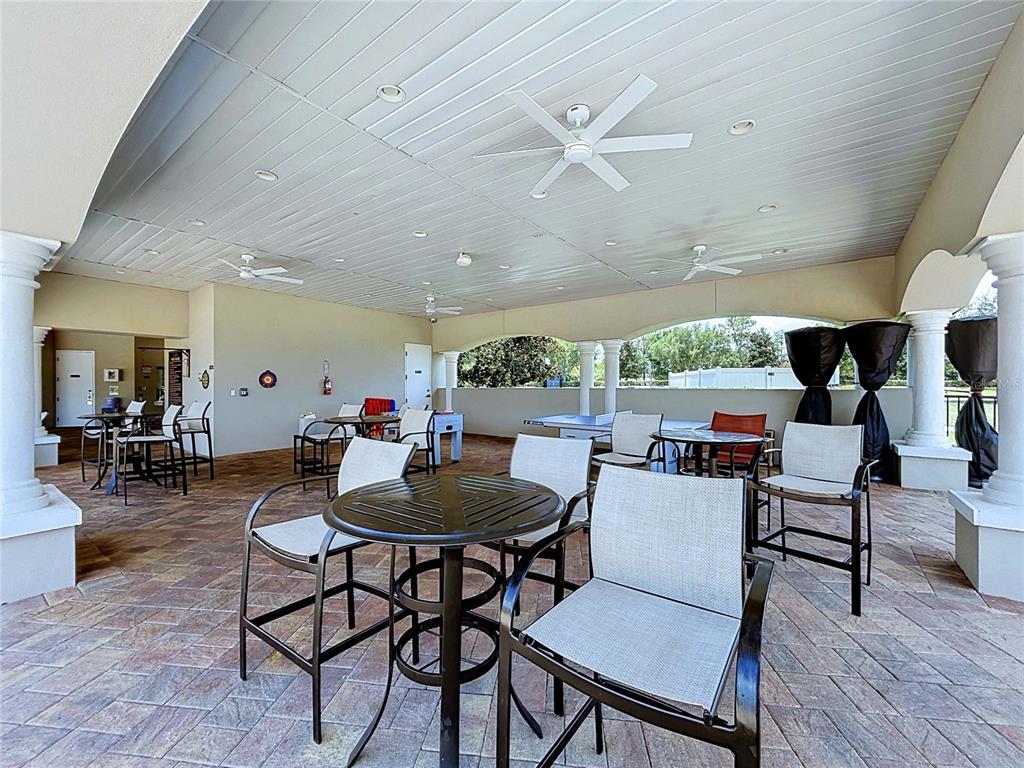 18078 Romanesque Court Spring Hill, FL 34610 - Photo 77 of 81 a living room with furniture and a large window