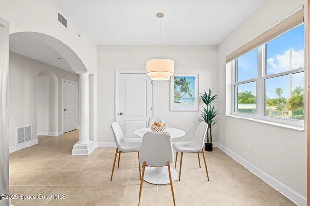 a view of a room that has a large window