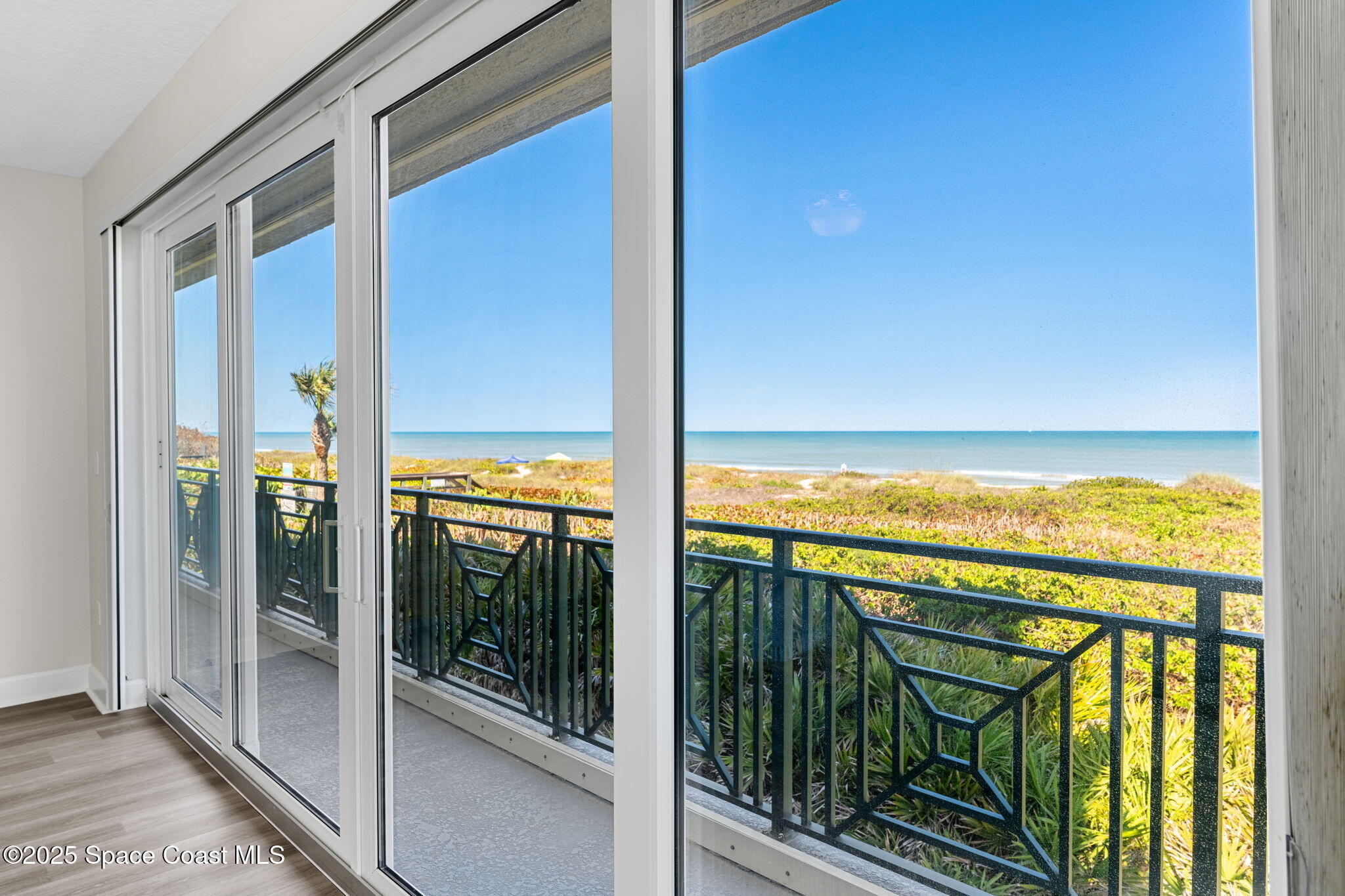 2485 South Atlantic Avenue, Unit 101 Cocoa Beach, FL 32931 - Photo 32 of 70 Primary Bedroom Balcony