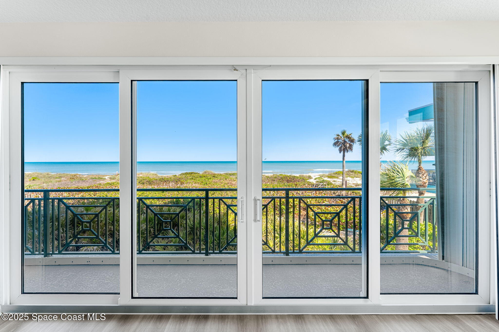 2485 South Atlantic Avenue, Unit 101 Cocoa Beach, FL 32931 - Photo 33 of 70 Primary bedroom Balcony