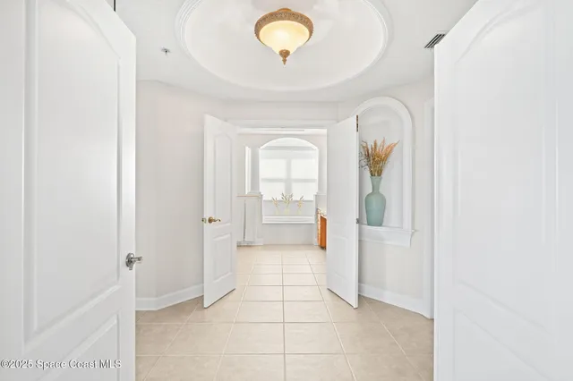 a bathroom with a sink a toilet a tub and shower