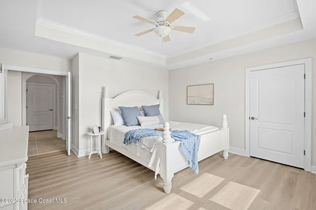 a room with a bed and a chair