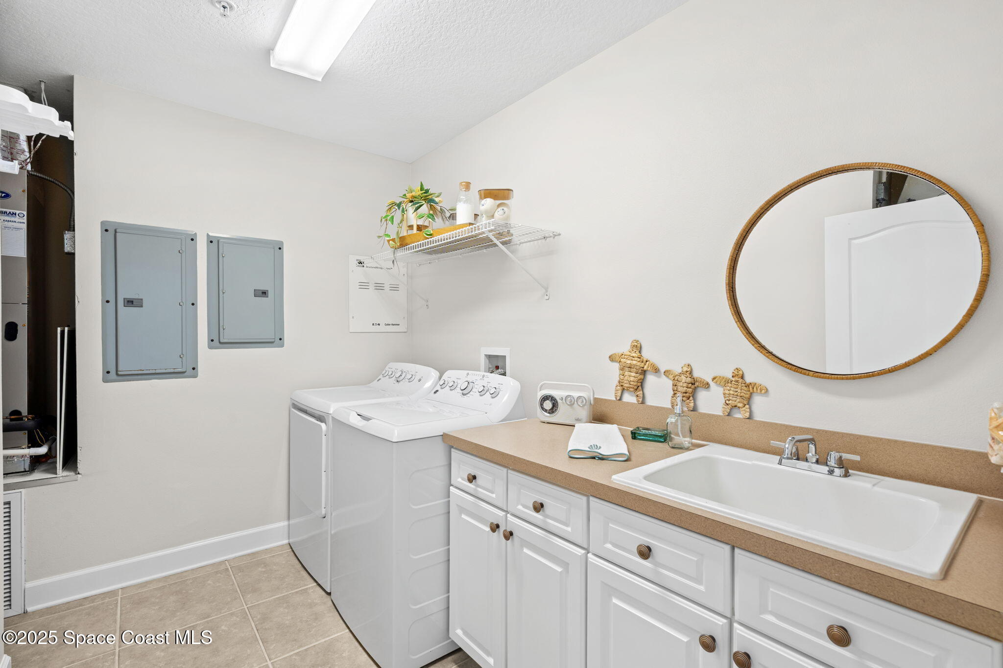 2485 South Atlantic Avenue, Unit 101 Cocoa Beach, FL 32931 - Photo 51 of 70 Laundry Room