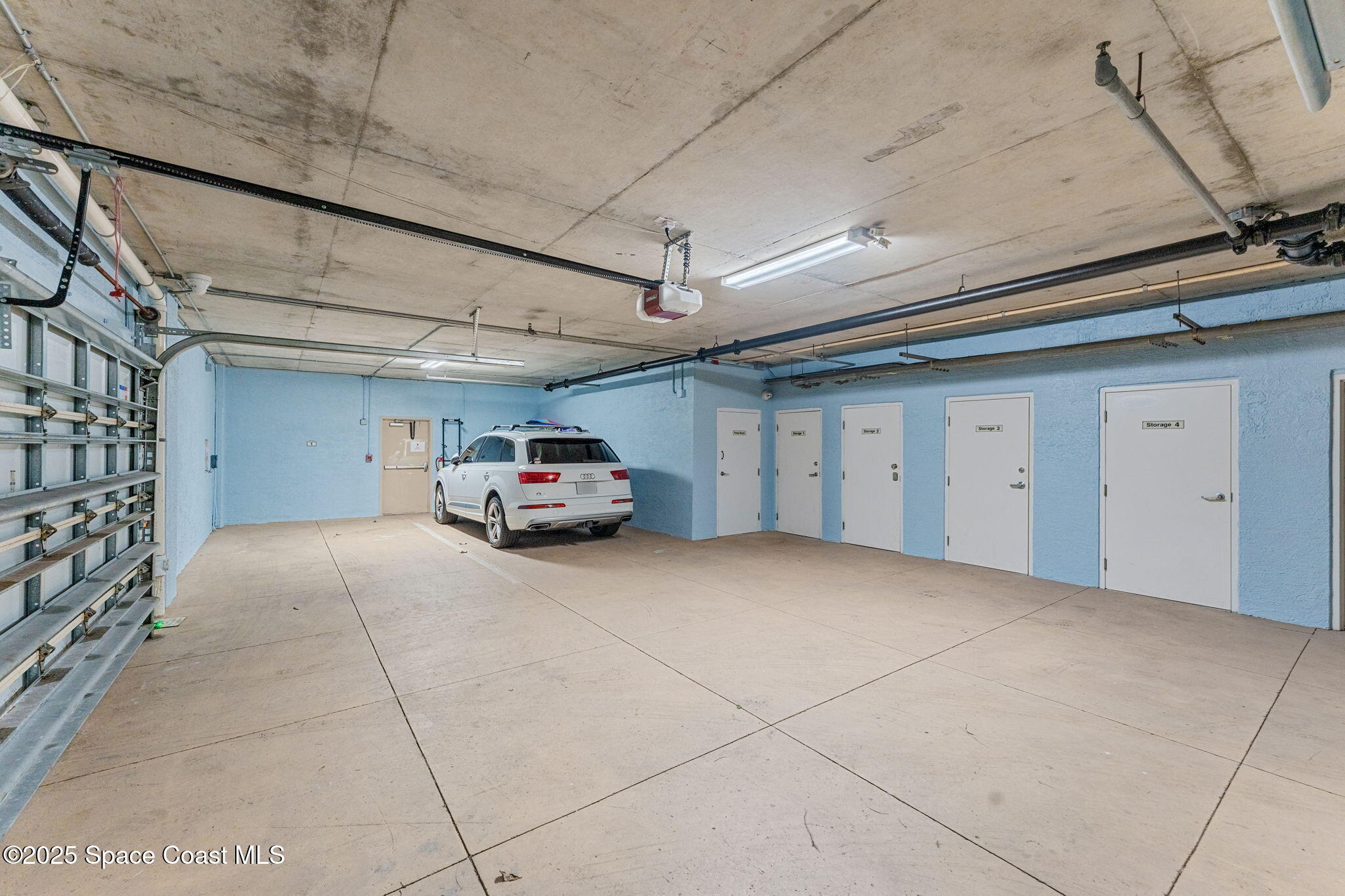 2485 South Atlantic Avenue, Unit 101 Cocoa Beach, FL 32931 - Photo 52 of 70 Garage Parking Space