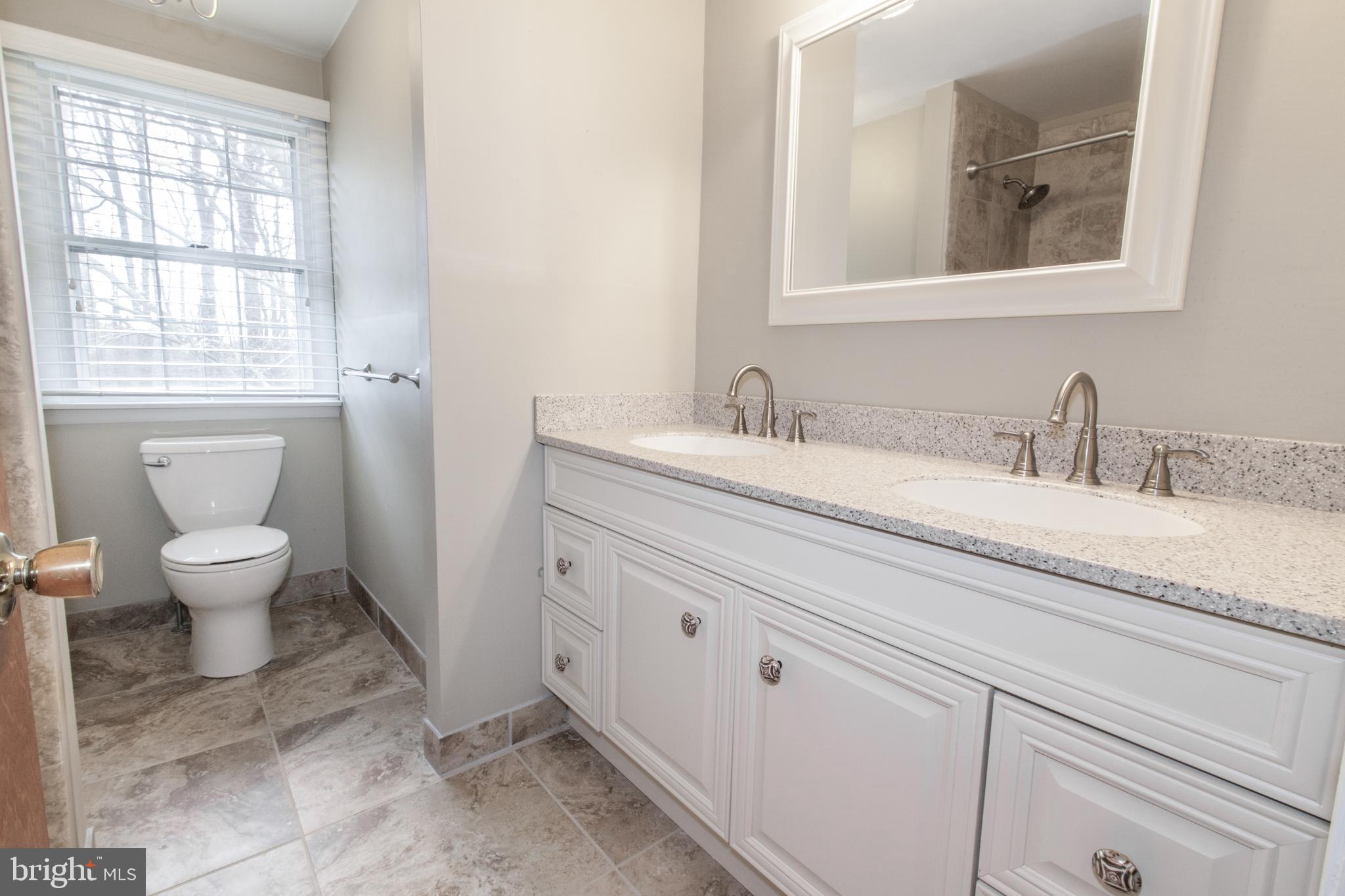 818 Petem Road Kingsville, MD 21087 - Photo 20 of 30 Remodeled Family Bath with dual vanity sinks