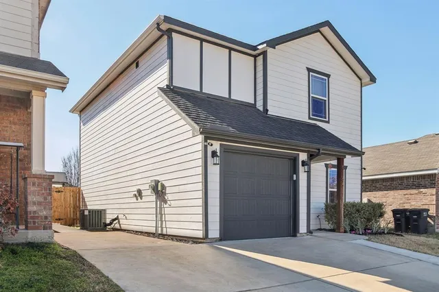 a view of a house with a garage