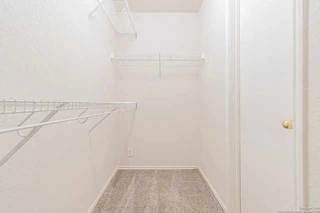 a view of small space with racks on the wall