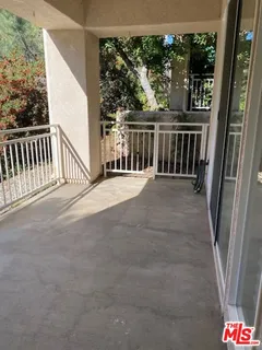 a view of a house with a street