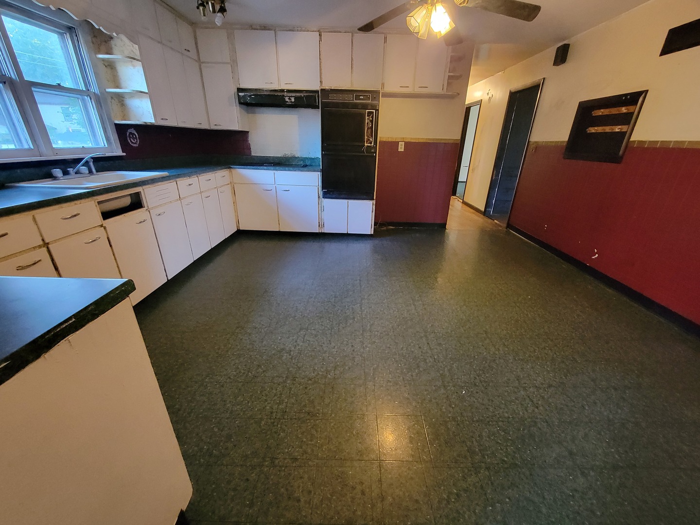 204 Williams Street Henry, IL 61537 - Photo 14 of 35 a kitchen with stainless steel appliances a refrigerator and a stove