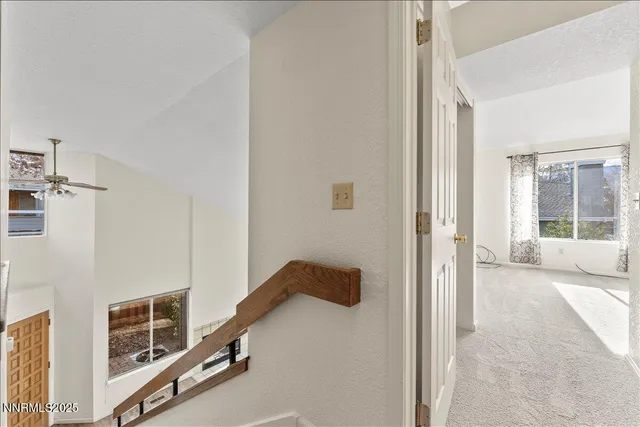 a view of a bathroom with bathtub and shower
