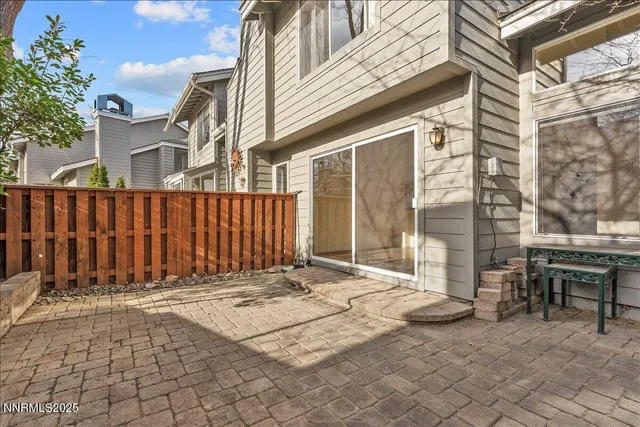 a view of a pathway with a garden