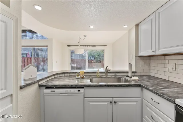 a view of a room with sliding glass door