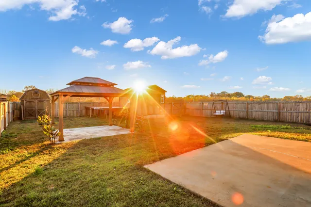 a view of a swimming pool with an ocean view