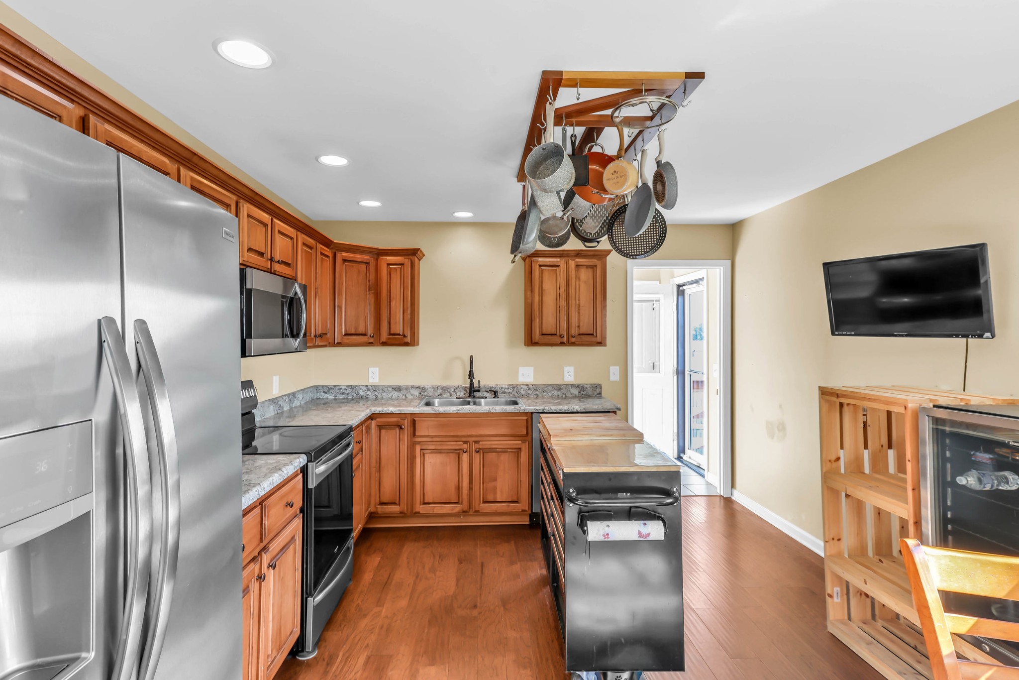 150 B T G T Road Portland, TN 37148 - Photo 10 of 20 a kitchen with stainless steel appliances granite countertop a sink stove and refrigerator