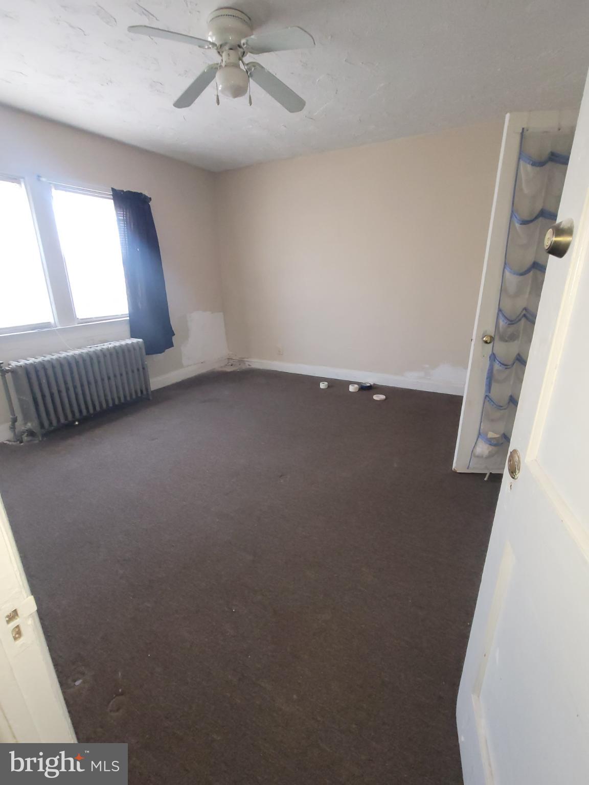 2523 Boarman Avenue Baltimore, MD 21215 - Photo 19 of 31 a view of an empty room with a window