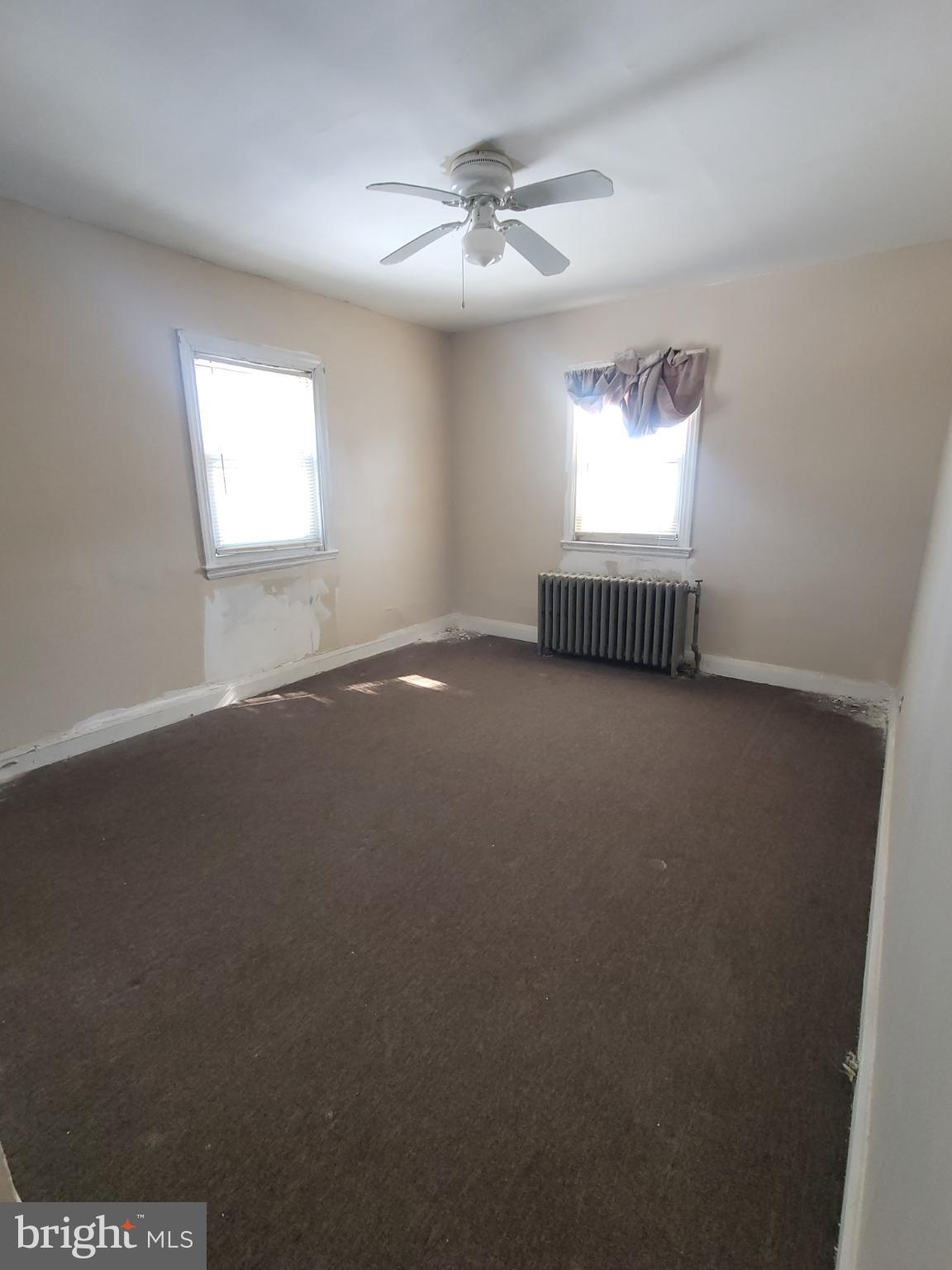 2523 Boarman Avenue Baltimore, MD 21215 - Photo 22 of 31 an empty room with a window