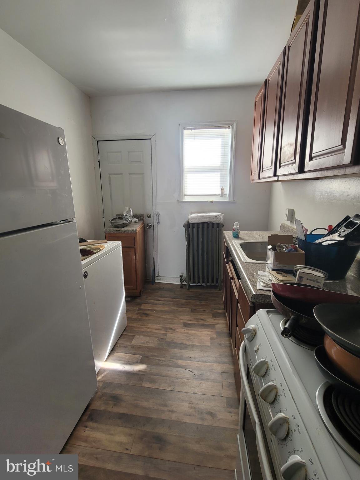 2523 Boarman Avenue Baltimore, MD 21215 - Photo 10 of 31 a kitchen with a sink appliances and cabinets