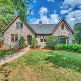 a front view of a house with yard