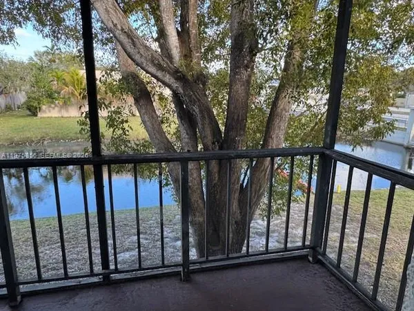 a view of a street from a balcony