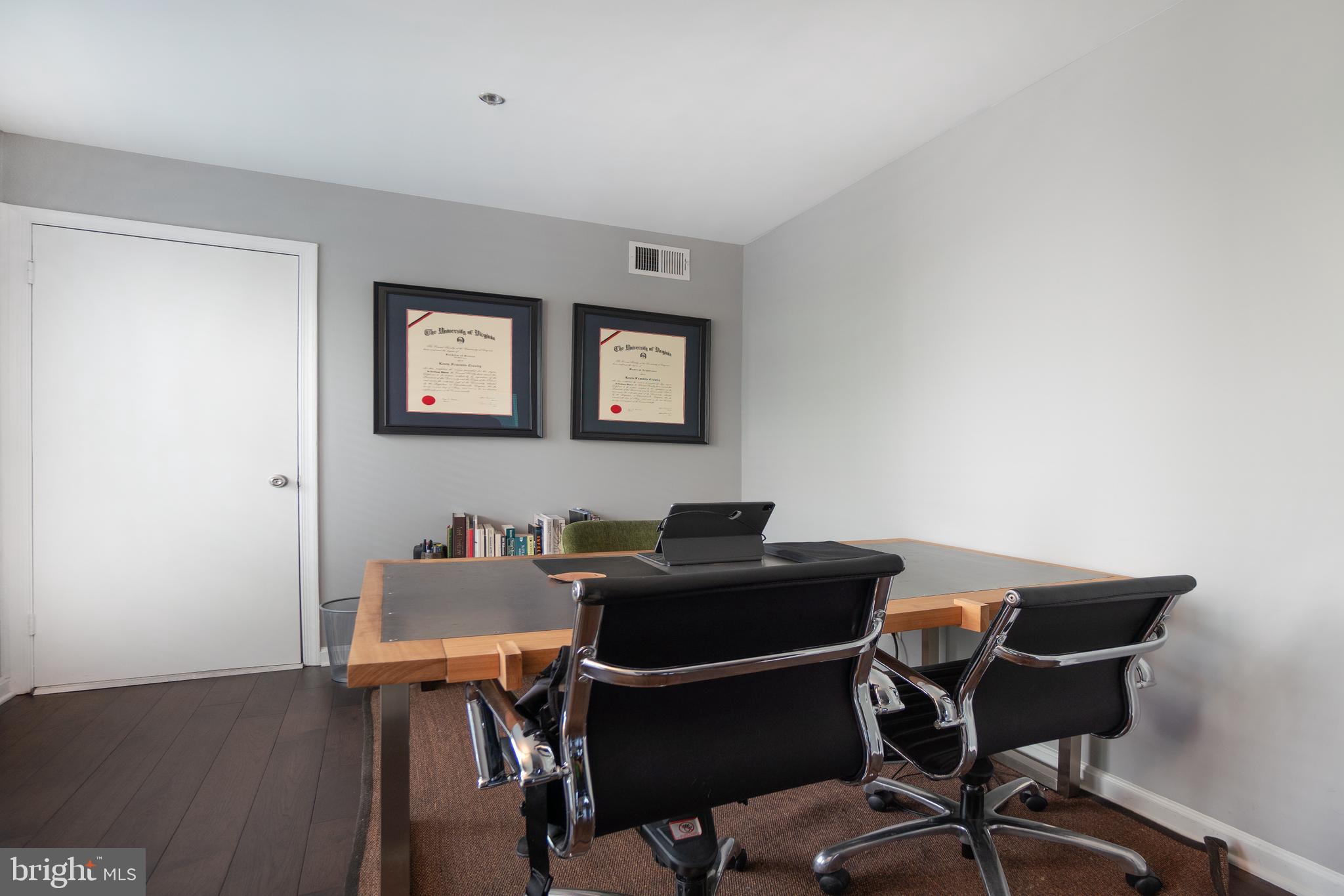 10248 Appalachian Circle, Unit 1D7 Oakton, VA 22124 - Photo 12 of 32 a work room with furniture and wooden floor