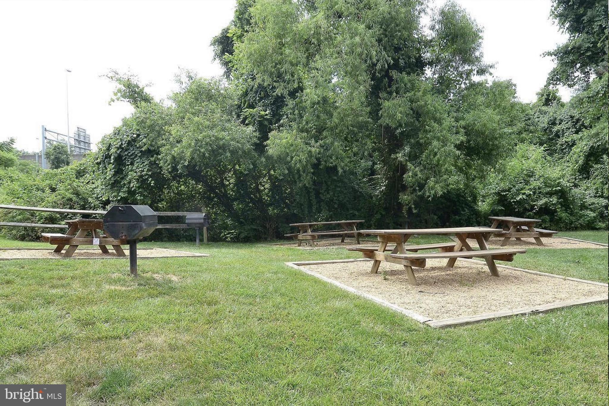 10248 Appalachian Circle, Unit 1D7 Oakton, VA 22124 - Photo 29 of 32 a view of an outdoor sitting area with chairs