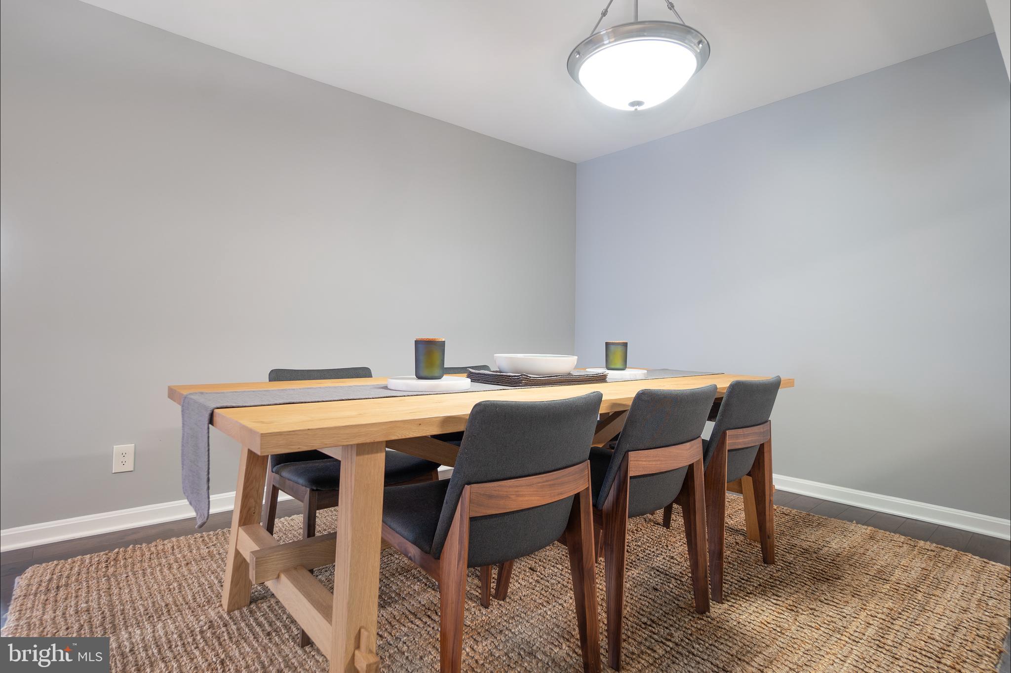 10248 Appalachian Circle, Unit 1D7 Oakton, VA 22124 - Photo 10 of 32 a view of a dining room with furniture