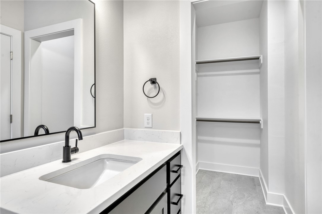 301 Cooner Street, Unit A College Station, TX 77840 - Photo 24 of 36 a bathroom with a sink and a mirror