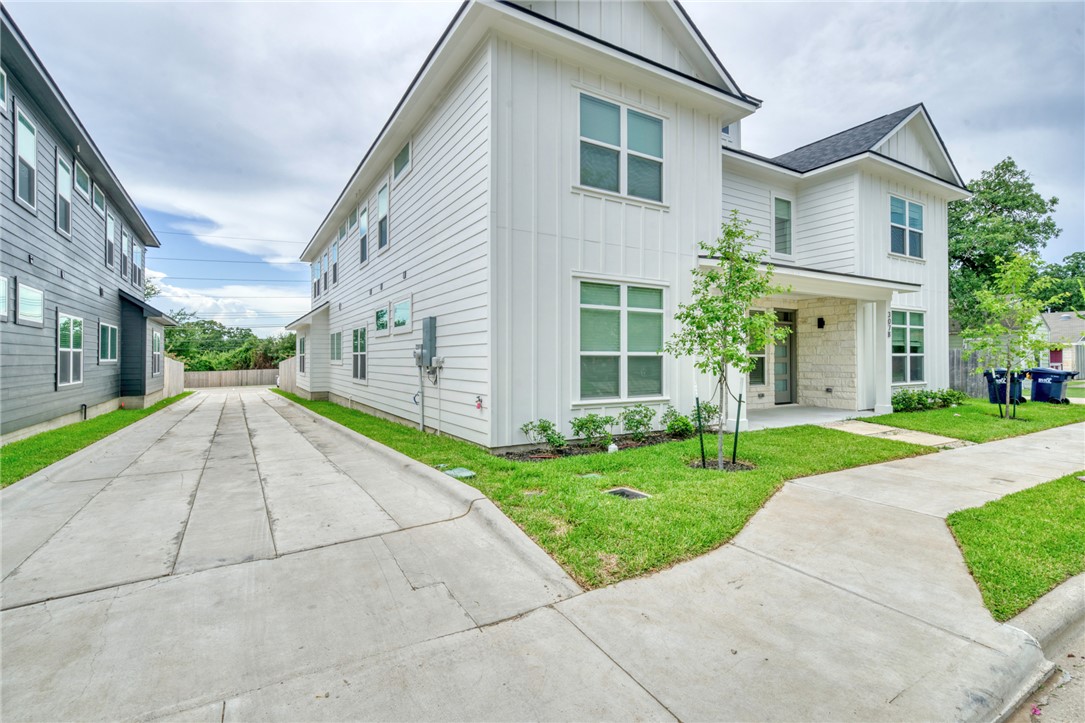 301 Cooner Street, Unit A College Station, TX 77840 - Photo 30 of 36 a view of a house with a yard