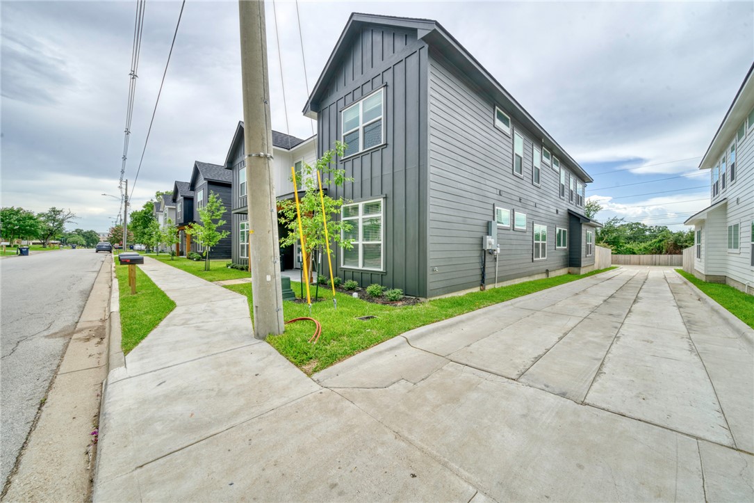301 Cooner Street, Unit A College Station, TX 77840 - Photo 31 of 36 a house view with a garden space