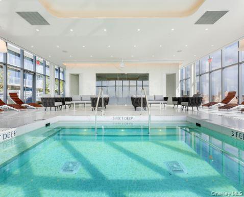 131-05 40 Road, Unit PH1D Queens, NY 11354 - Photo 18 of 23 View of indoor pool