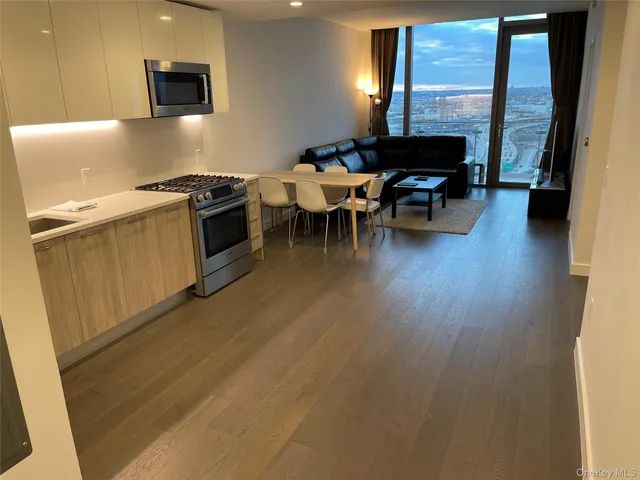 a view of a chairs and table in a patio