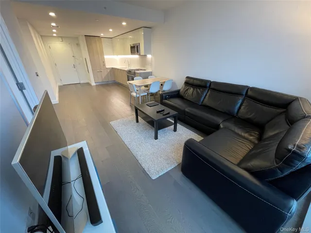 a living room with furniture and a table